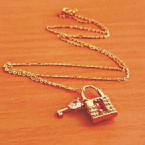 .925 Sterling: 18k gold plated sterling  necklace with key to my heart…